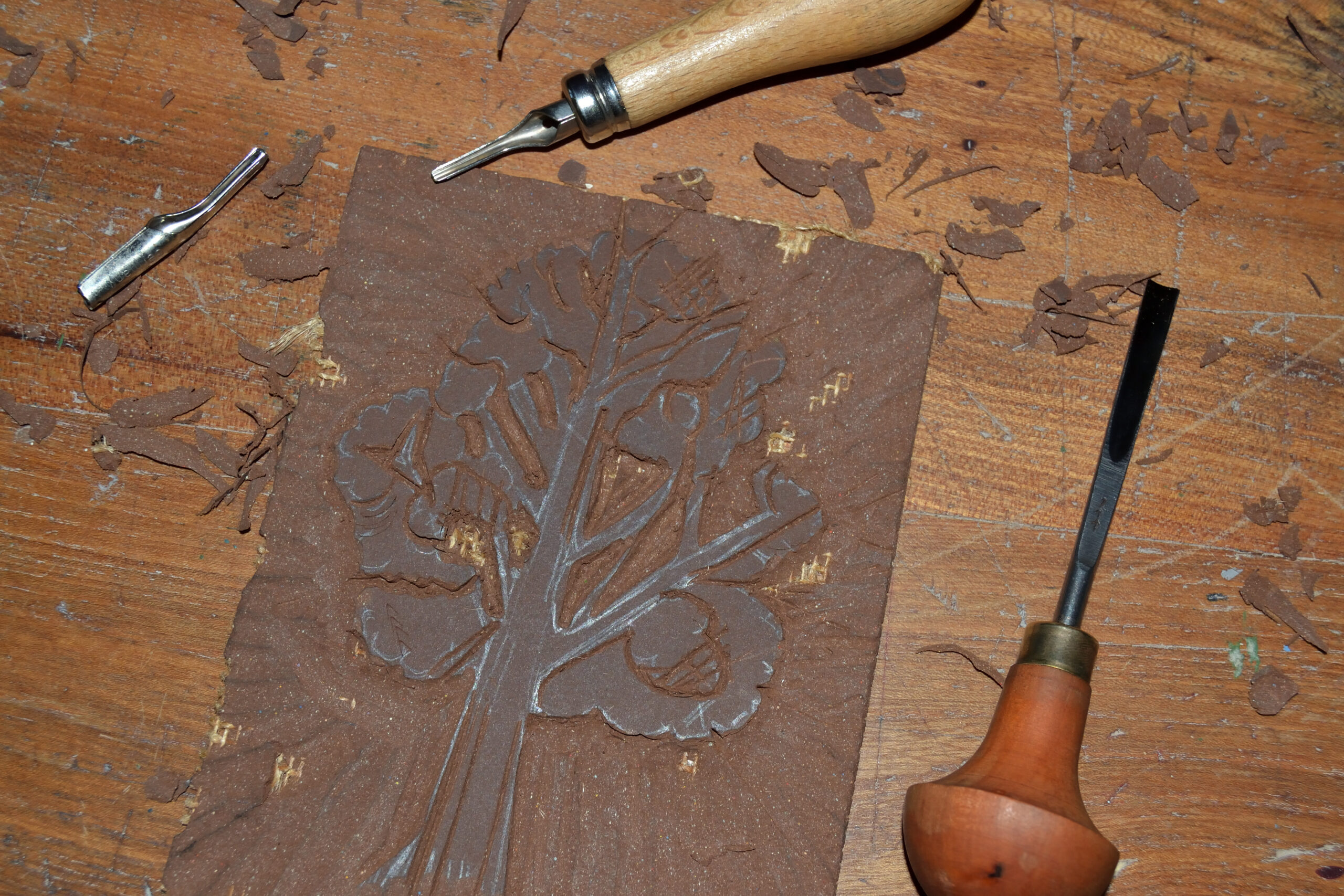 Analog printmaking — hand-carved linocut and intaglio etching